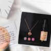 Rose gold aromatherapy necklace in a beautiful gift box with Bliss essential oil blend